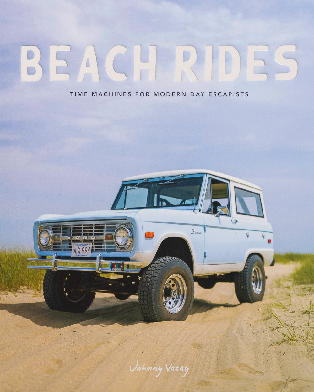 The detail view of the Johnny Vacay Beach Rides Coffee Table Book at Southern Tide - White