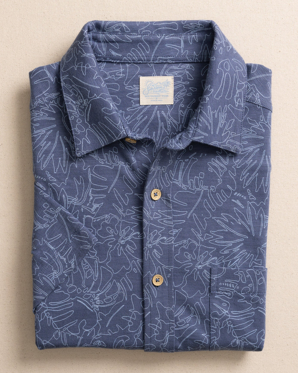 The front view of the Southern Tide Beachcast Floral Fusion Knit Short Sleeve Sport Shirt by Southern Tide -  Light Indigo