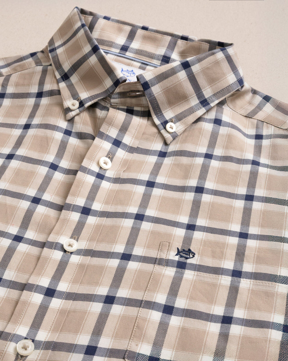 The detail view of the Southern Tide Beachrock Plaid Skipjack Long Sleeve Sport Shirt by Southern Tide - Sandstone Khaki