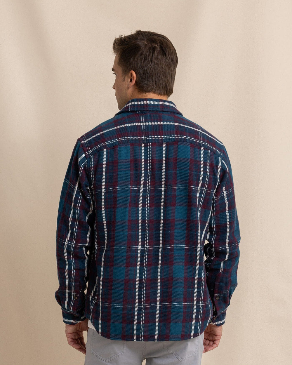 The back view of the Southern Tide Beachwood Plaid Twill Long Sleeve Shirt by Southern Tide - Dress Blue