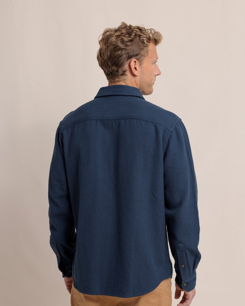 The back view of the Southern Tide Beachwood Solid Twill Long Sleeve Shirt by Southern Tide - Dress Blue