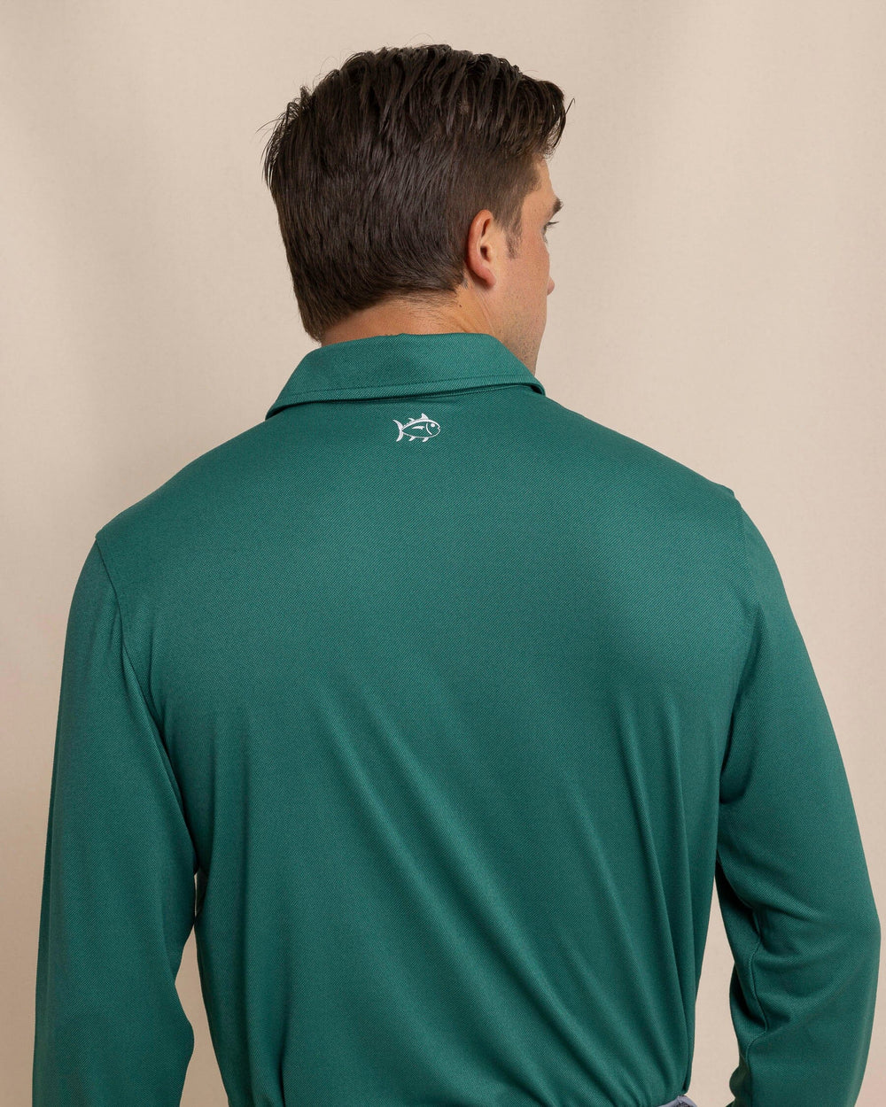 The back view of the Southern Tide Belfair Performance Long Sleeve Polo by Southern Tide - Fir