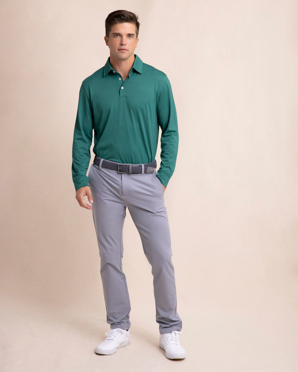 The front view of the Southern Tide Belfair Performance Long Sleeve Polo by Southern Tide - Fir