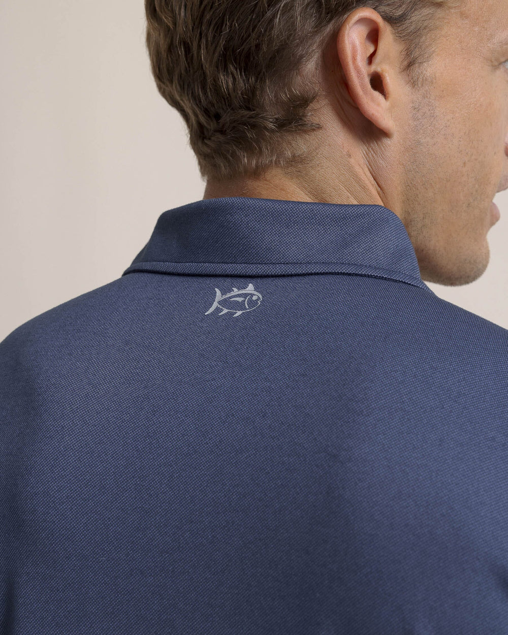 The detail view of the Southern Tide Belfair Performance Long Sleeve Polo by Southern Tide - Light Indigo