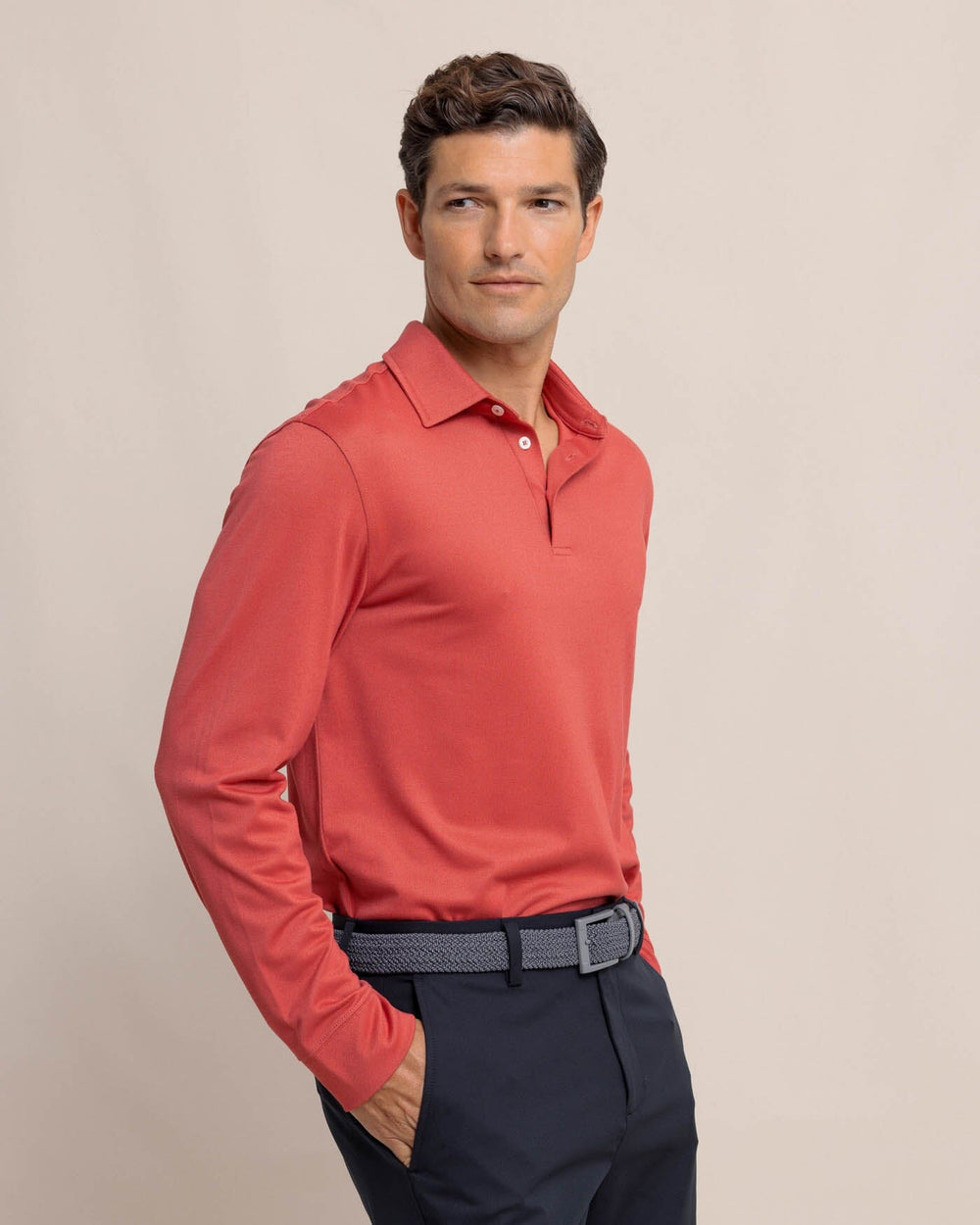 The front view of the Southern Tide Belfair Performance Long Sleeve Polo by Southern Tide - Mineral Red