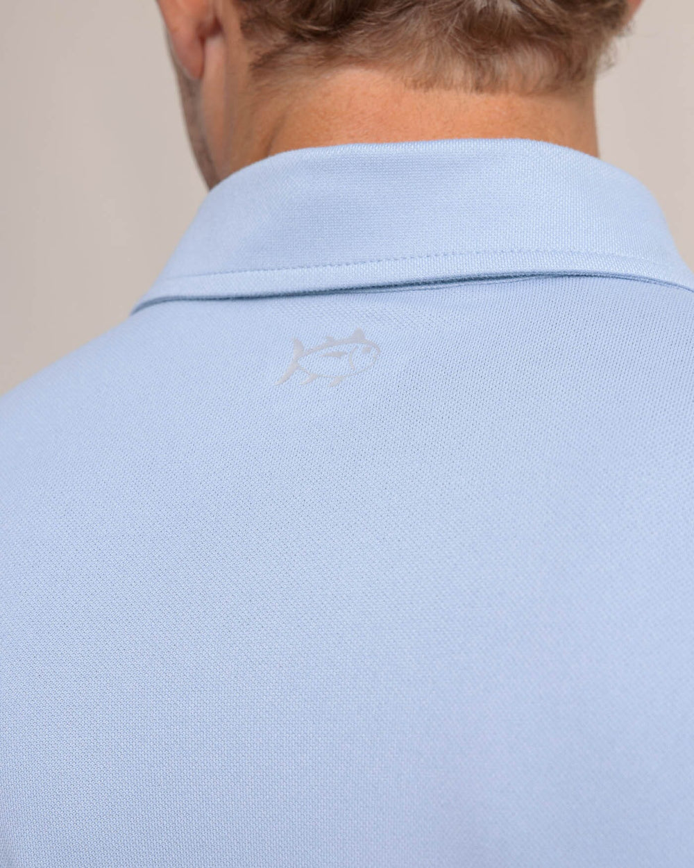 The detail view of the Southern Tide Belfair Performance Long Sleeve Polo by Southern Tide - Triumph Blue