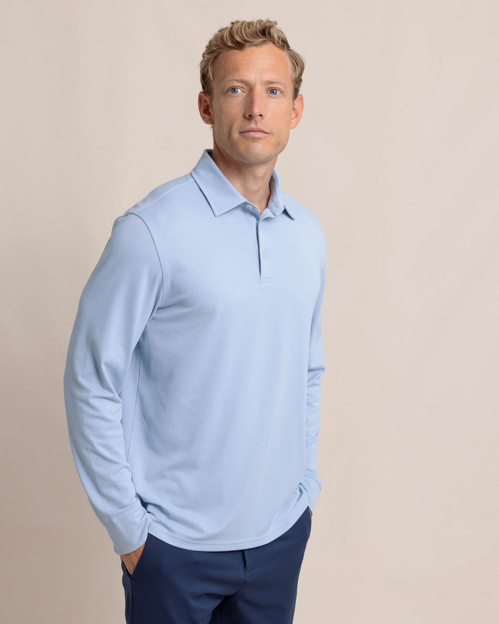 The front view of the Southern Tide Belfair Performance Long Sleeve Polo by Southern Tide - Triumph Blue