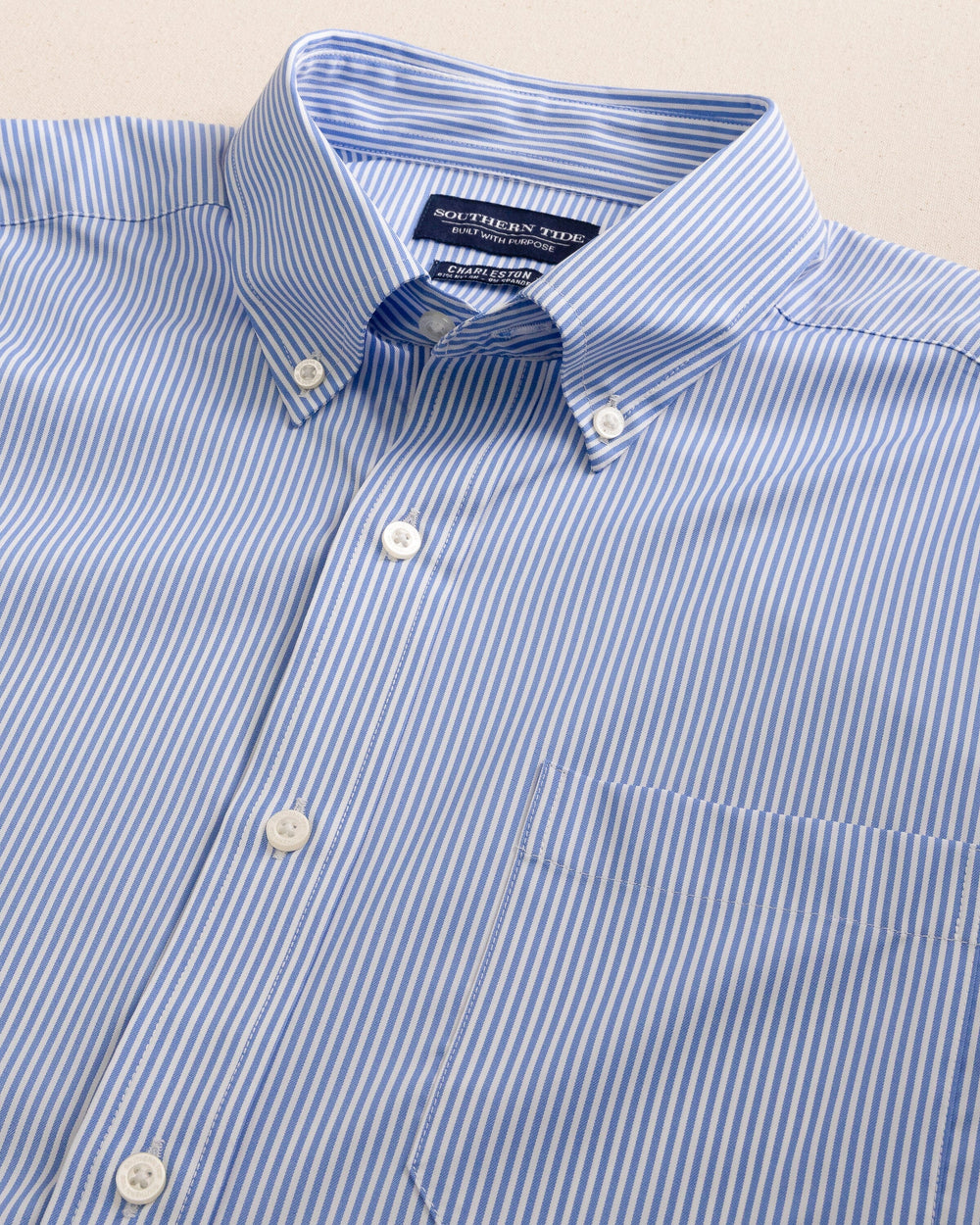 The detail view of the Southern Tide Bengal Stripe brrr°® Intercoastal Sport Shirt by Southern Tide - Cobalt Blue