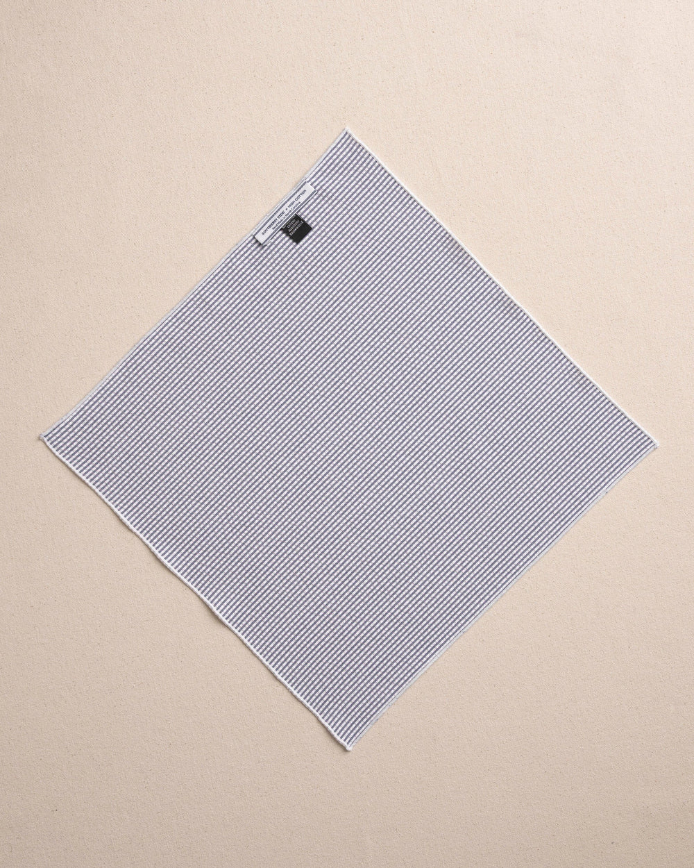 The back view of the Southern Tide Blue and White Seersucker Pocket Square by Southern Tide - Blue