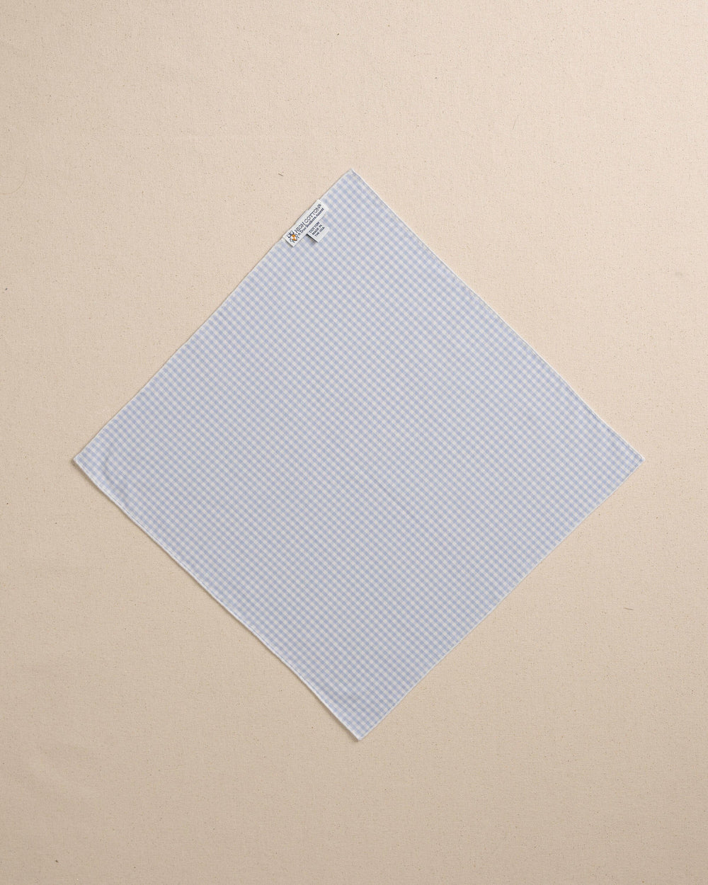 The back view of the High Cotton Blue Gingham Pocket Square at Southern Tide - Blue