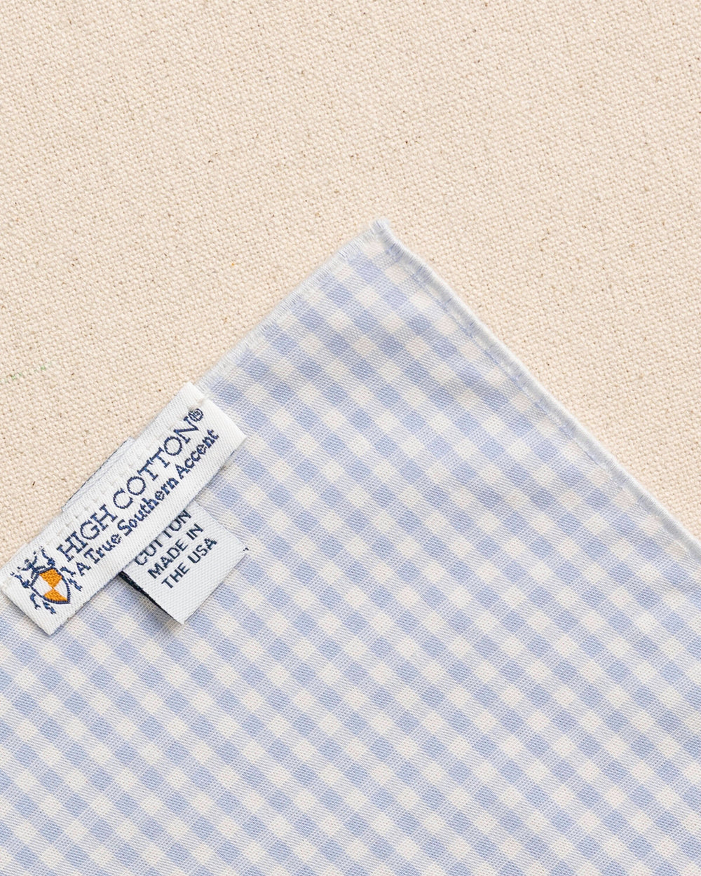 The detail back view of the High Cotton Blue Gingham Pocket Square at Southern Tide - Blue