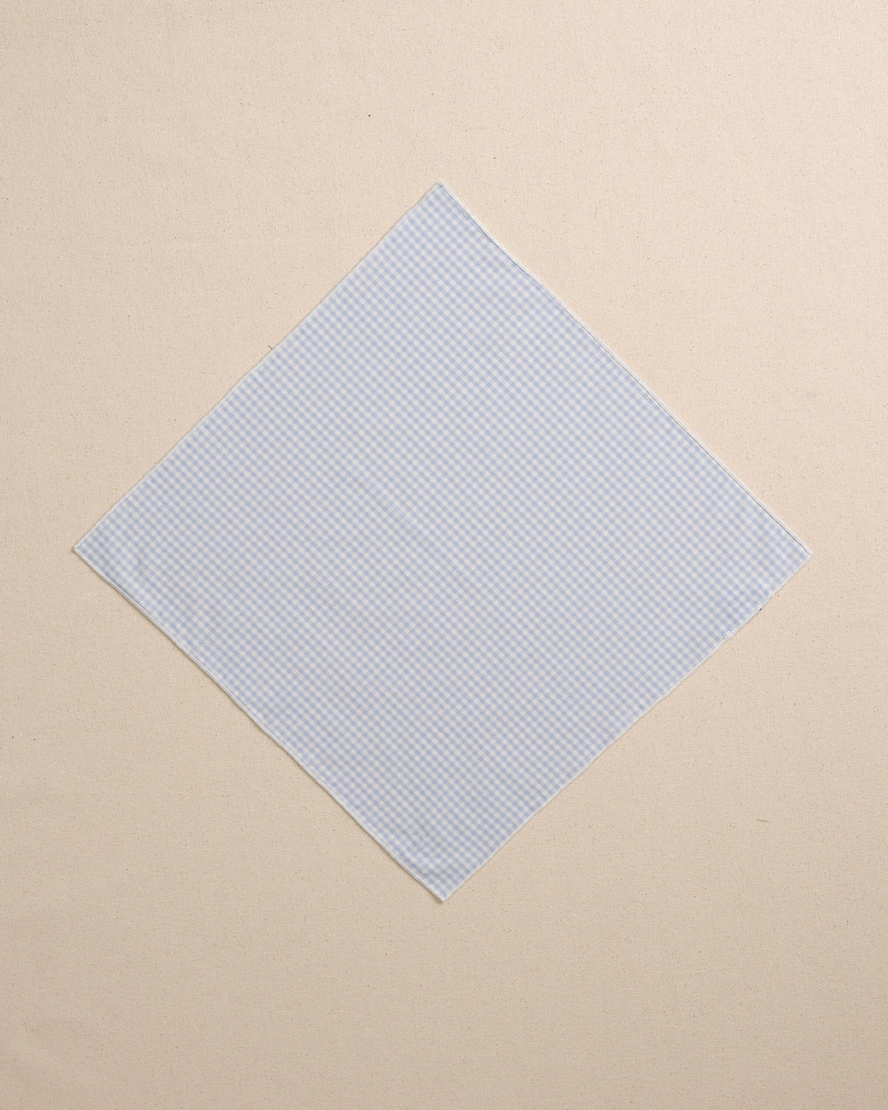 The front view of the High Cotton Blue Gingham Pocket Square at Southern Tide - Blue