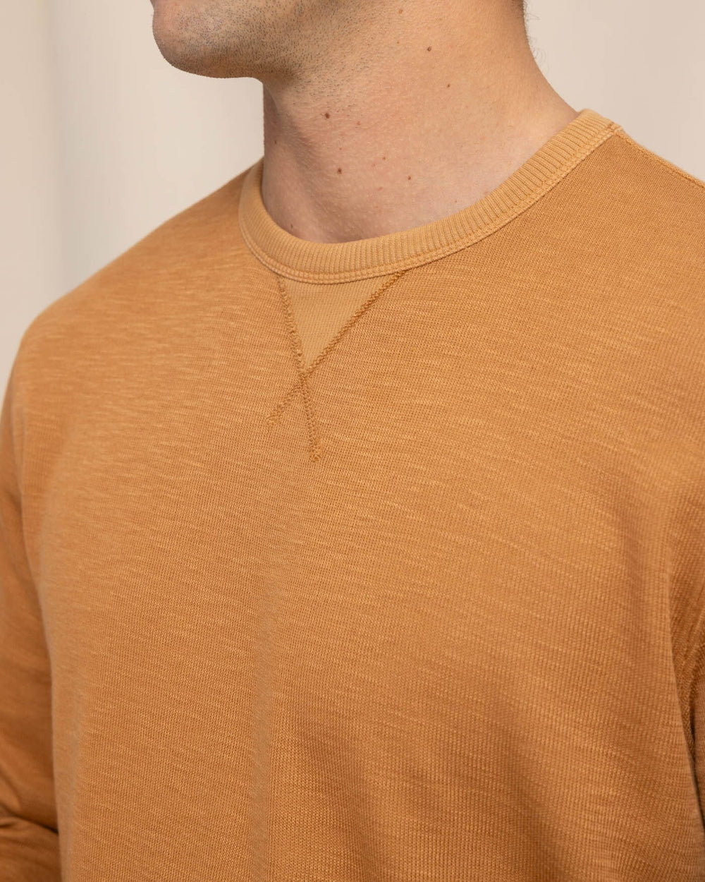 The detail view of the Southern Tide Bluffton Crewneck by Southern Tide - Hazelnut Khaki