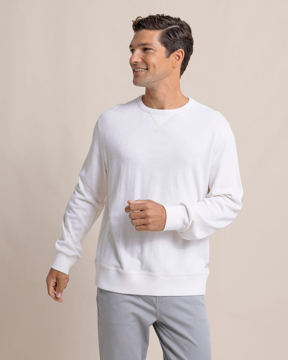 The front view of the Southern Tide Bluffton Crewneck by Southern Tide - Sand White