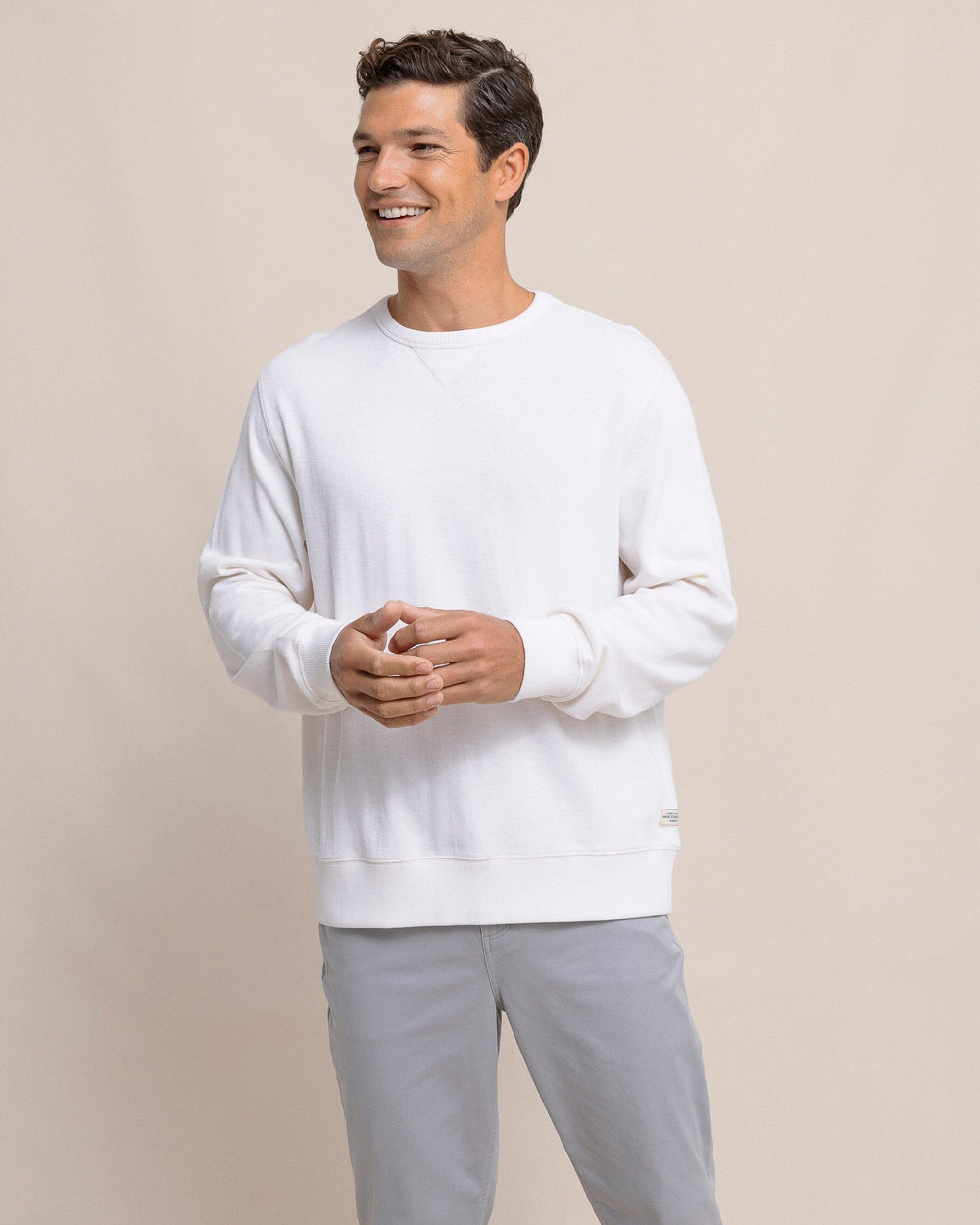 The front view of the Southern Tide Bluffton Crewneck by Southern Tide - Sand White