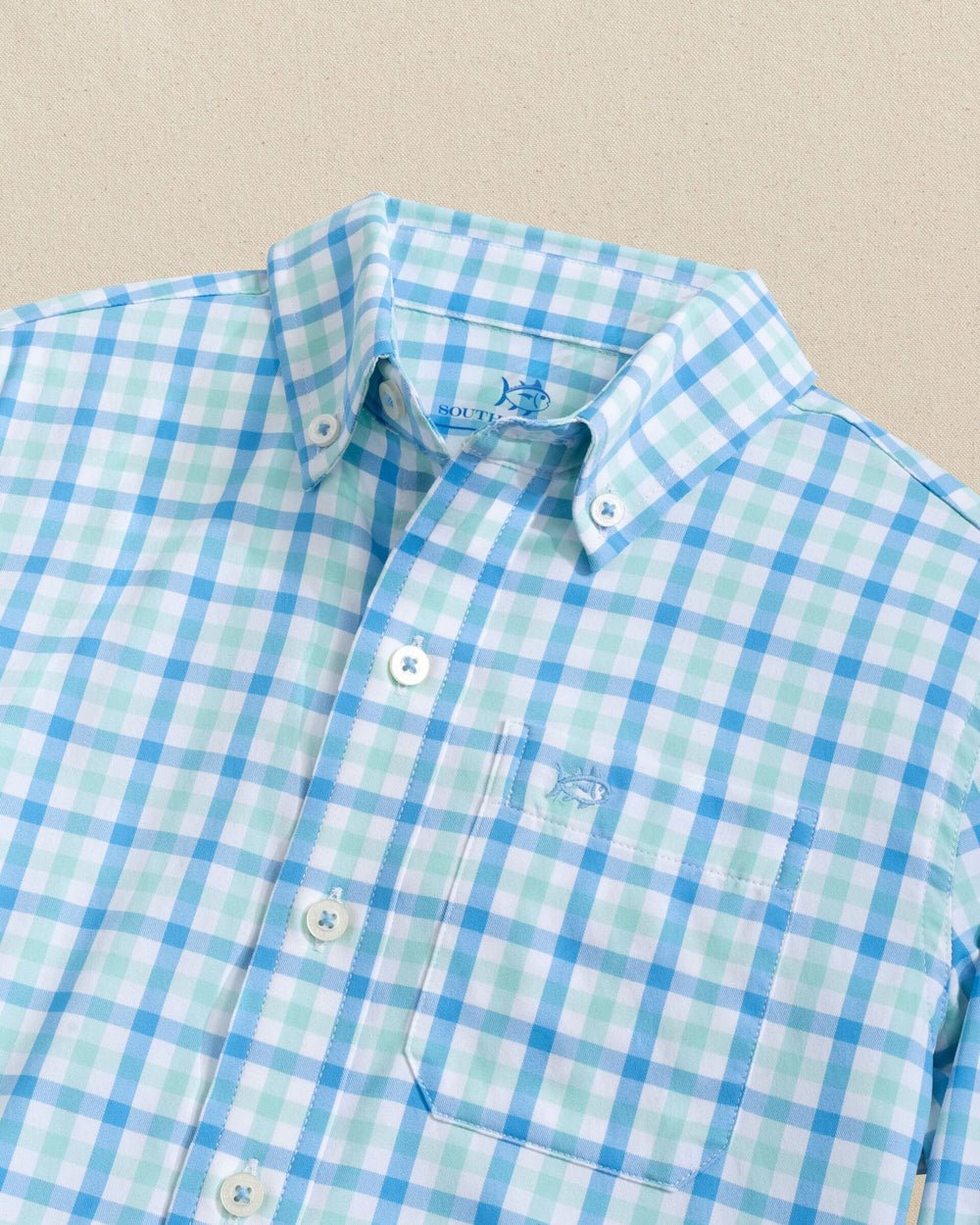 The detail view of the Southern Tide Boys Albemarle Plaid Intercoastal Sport Shirt by Southern Tide - Boat Blue