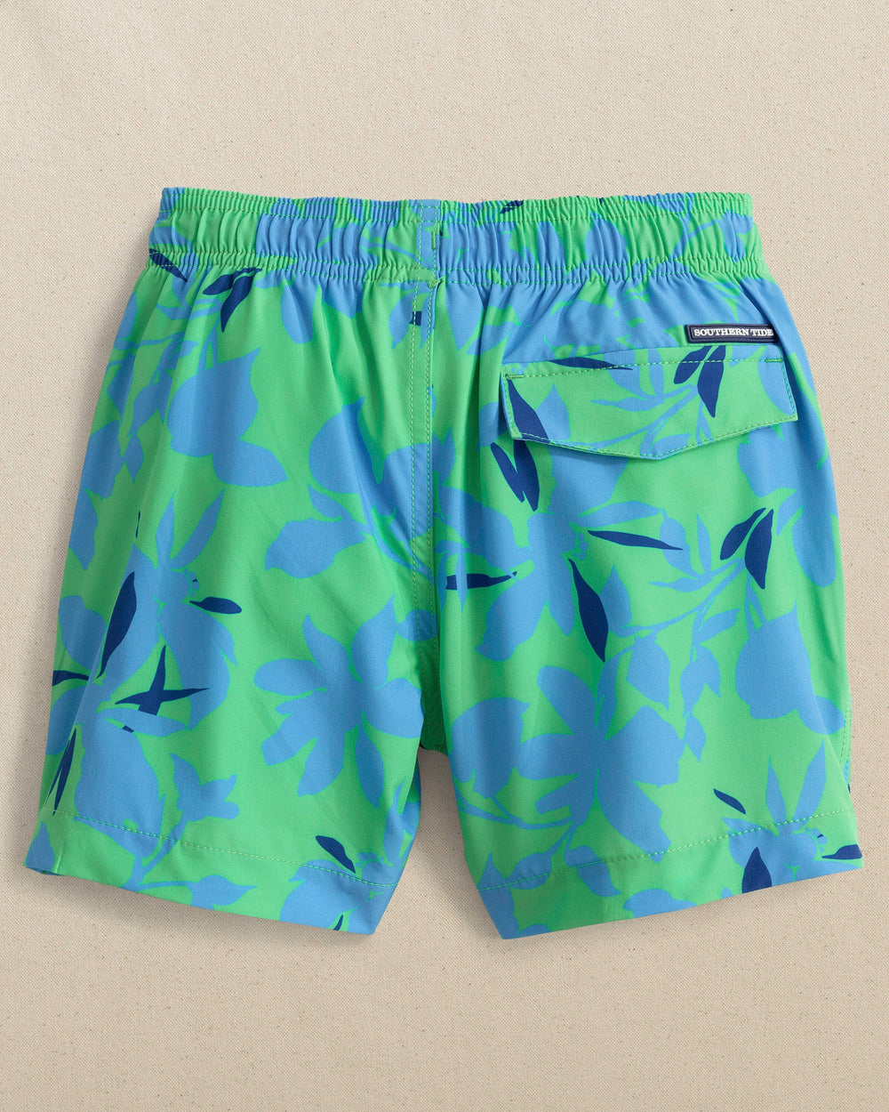 The back view of the Southern Tide Boys Blossom Bay Swim Trunk by Southern Tide - Jade Green