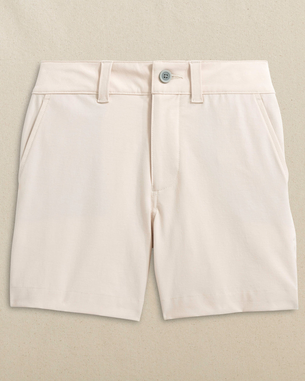 The front view of the Southern Tide Boys Bogey Short by Southern Tide - Stone