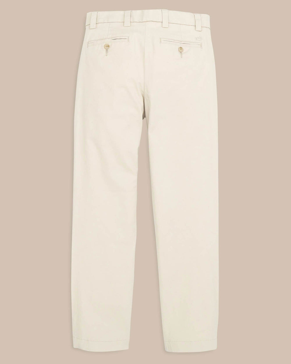 The back view of the Boys Channel Marker Pant by Southern Tide - Light Khaki