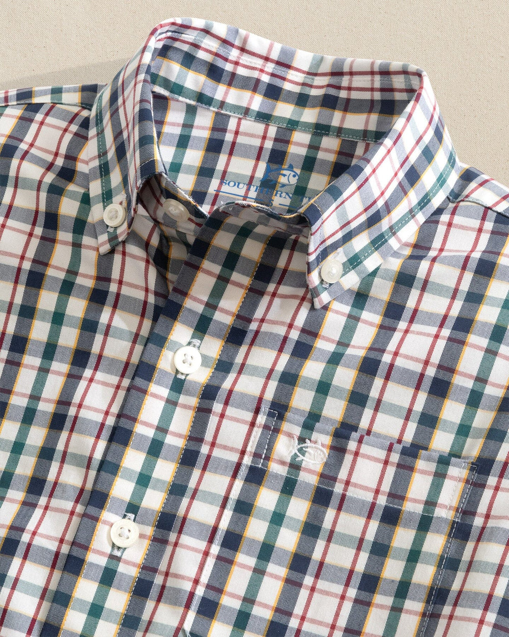 The detail view of the Southern Tide Boys Charleston Master Plaid Long Sleeve Sport Shirt by Southern Tide - Forest Biome