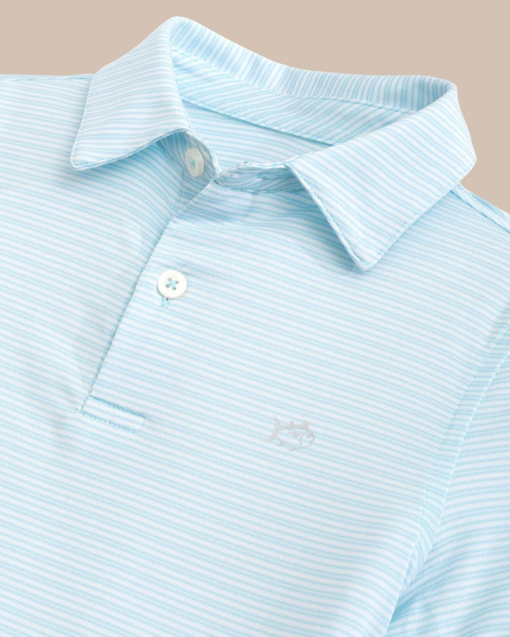 The detail view of the Southern Tide Boys Driver Camden Stripe Performance Polo by Southern Tide - Dream Blue