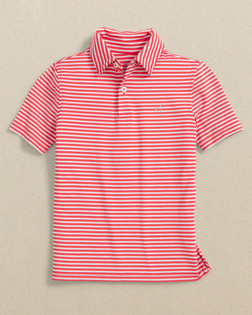 The front view of the Southern Tide Kids Driver Caravel Stripe Performance Polo by Southern Tide - Poppy Red