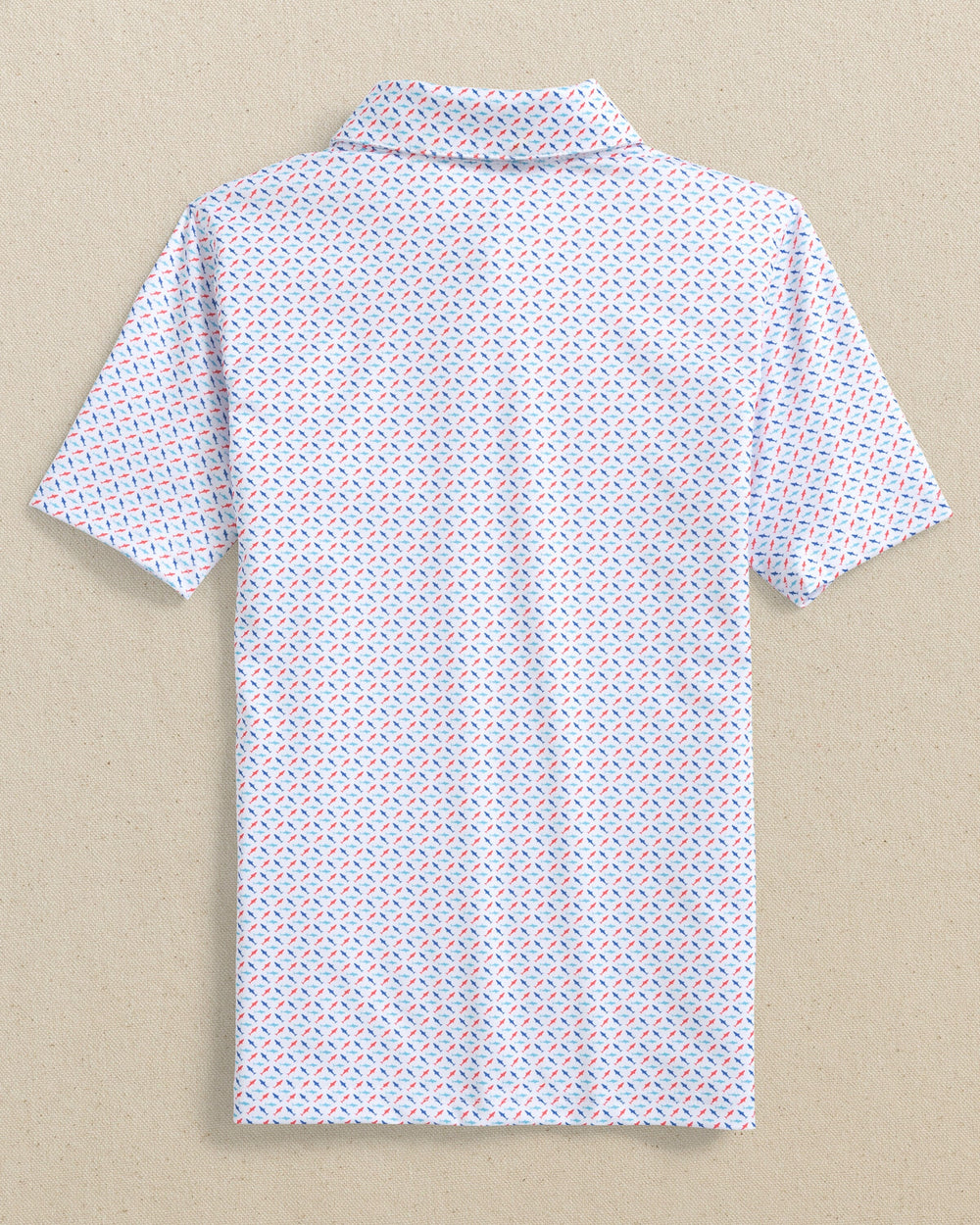 The back view of the Southern Tide Boys Driver Fin-tastic Catch Printed Performance Polo by Southern Tide - Classic White