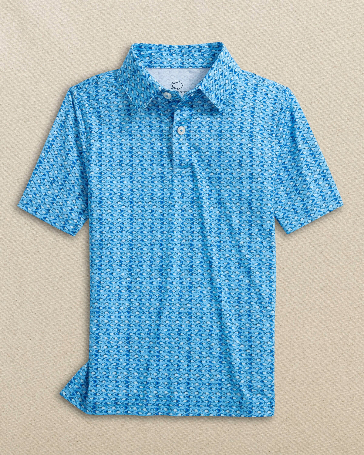 The front view of the Southern Tide Boys Driver Fish Printed Performance Polo by Southern Tide - Ocean Channel