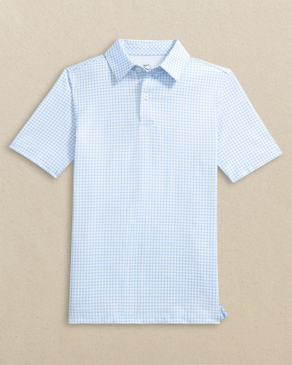 The front view of the Southern Tide Boys Driver Gingham Printed Performance Polo by Southern Tide - Tide Blue
