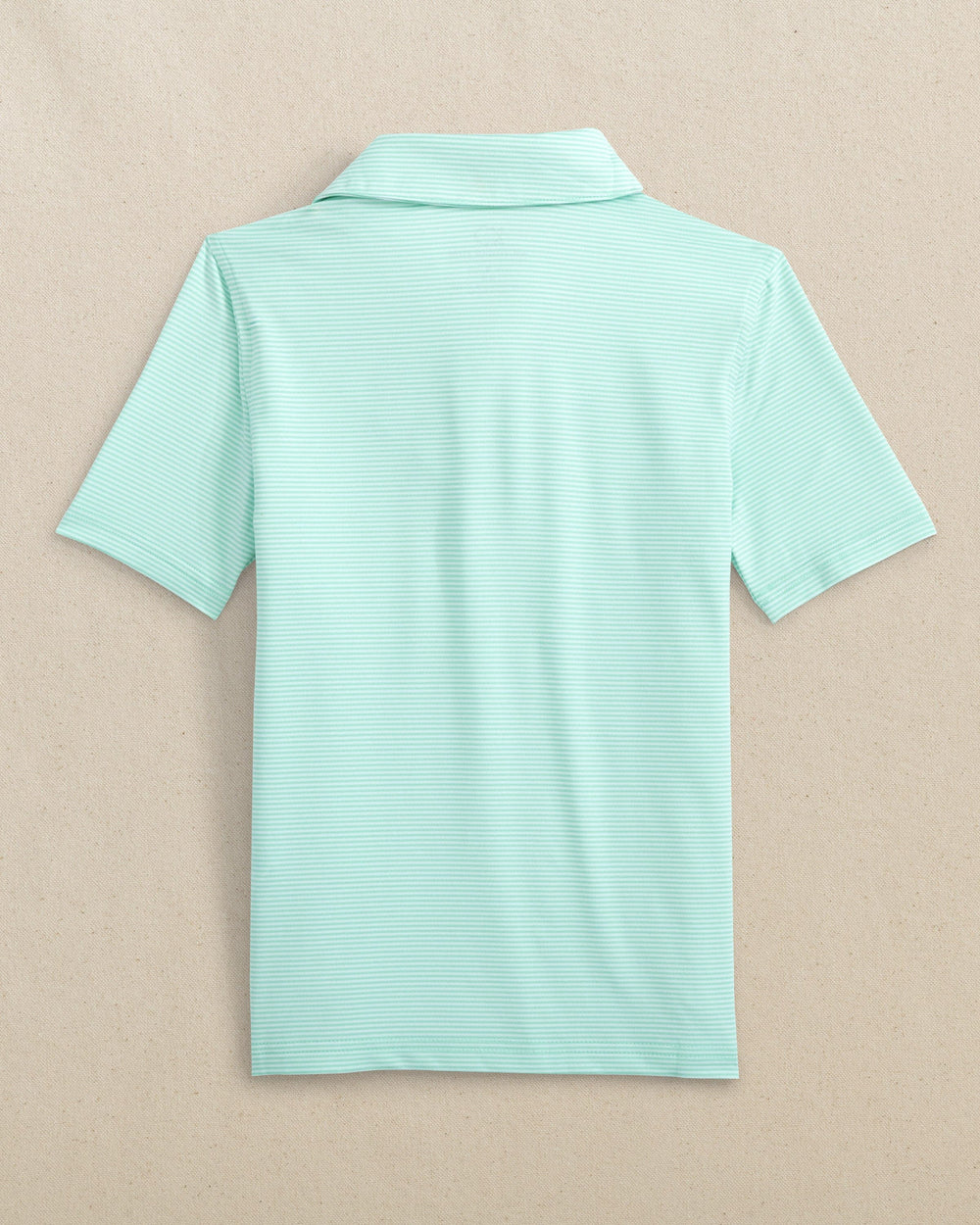The back view of the Southern Tide Boys Driver Meadowbrook Stripe Performance Polo by Southern Tide - Garden Grove
