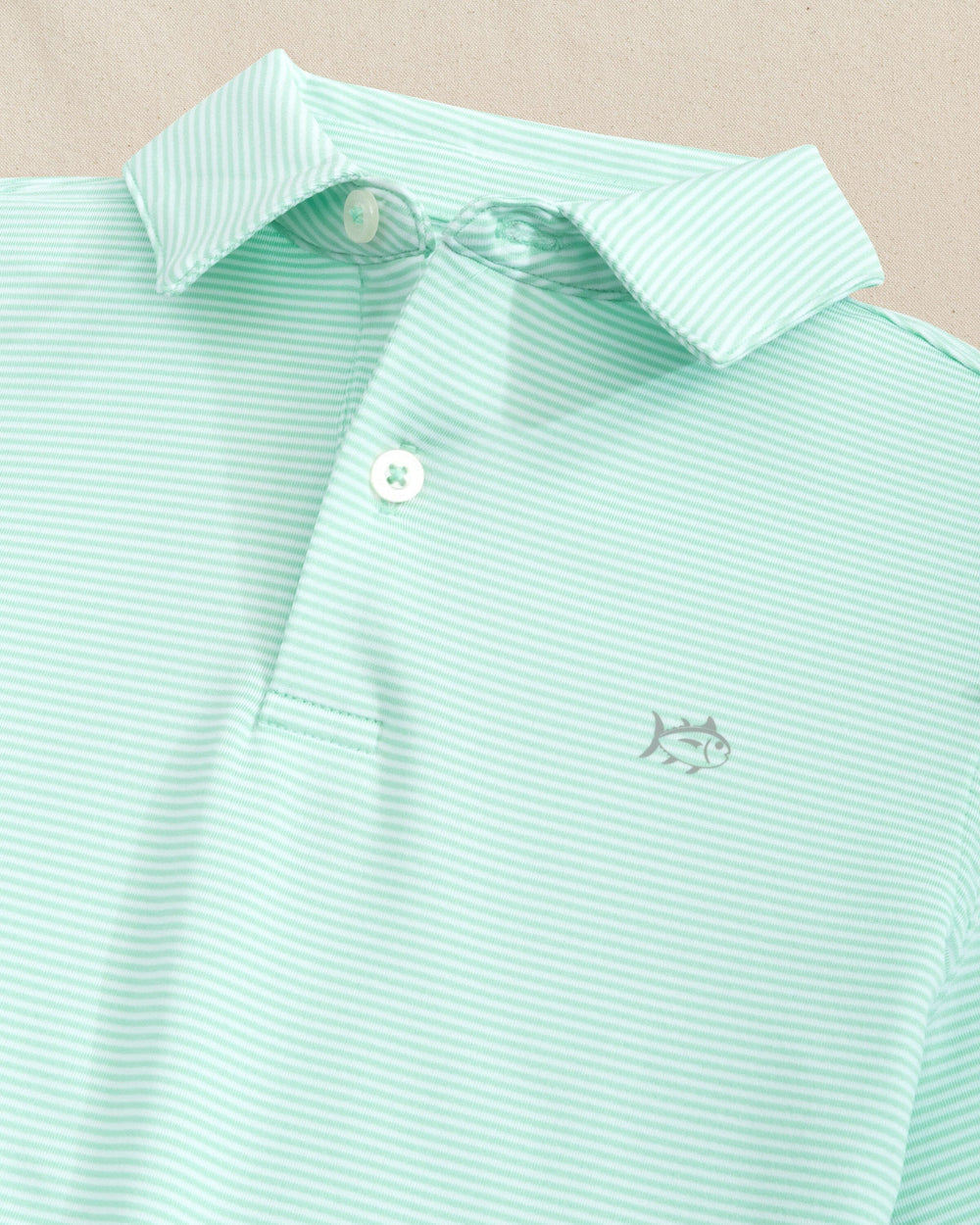 The detail view of the Southern Tide Boys Driver Meadowbrook Stripe Performance Polo by Southern Tide - Garden Grove