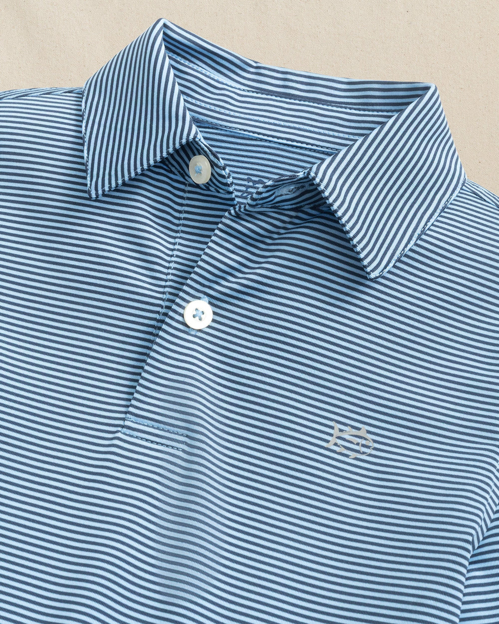 The collar view of the Southern Tide Boys Driver Meadowbrook Stripe Performance Polo by Southern Tide - Ocean Channel