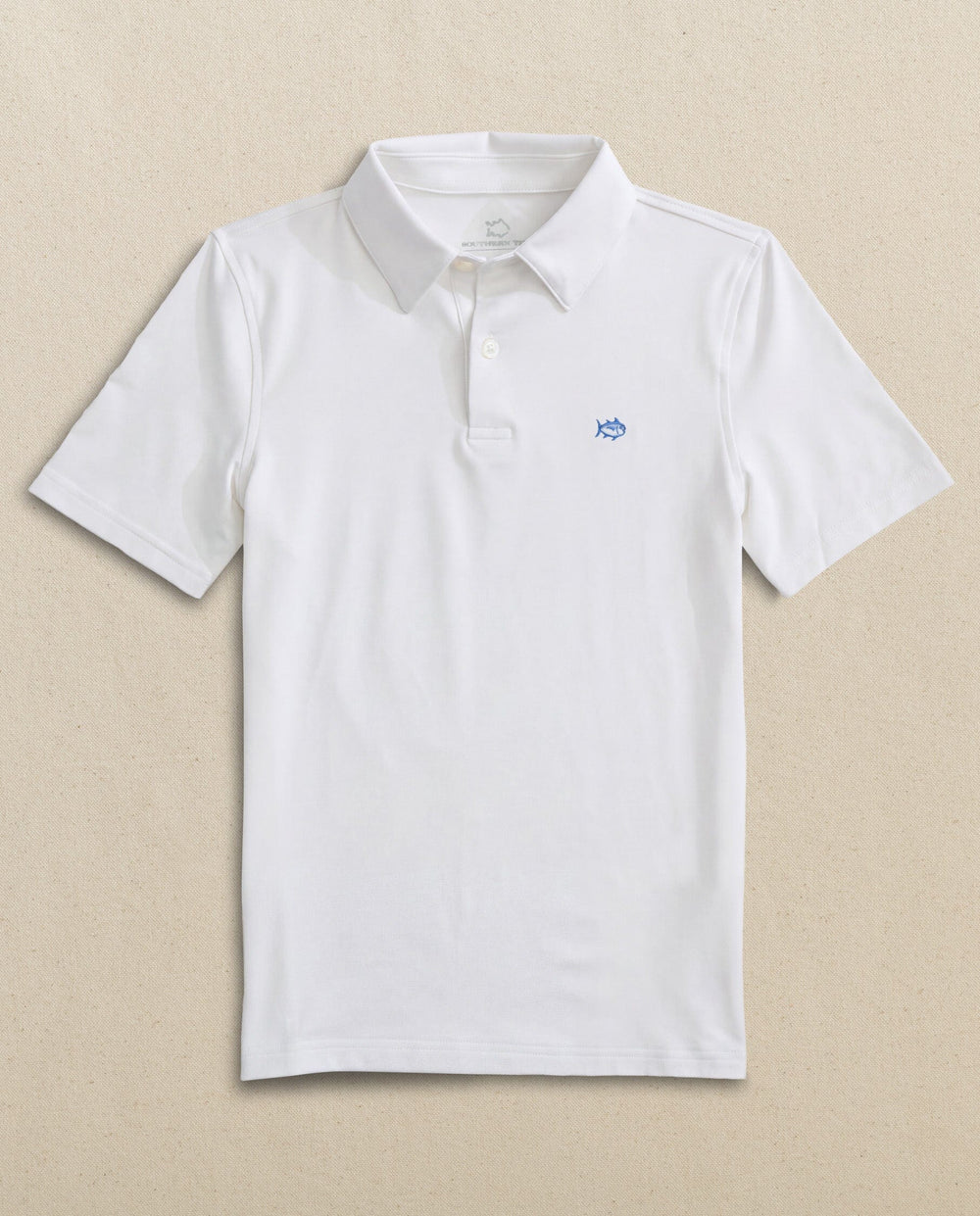 The front view of the Southern Tide Boys Driver Performance Skipjack Polo by Southern Tide - Classic White