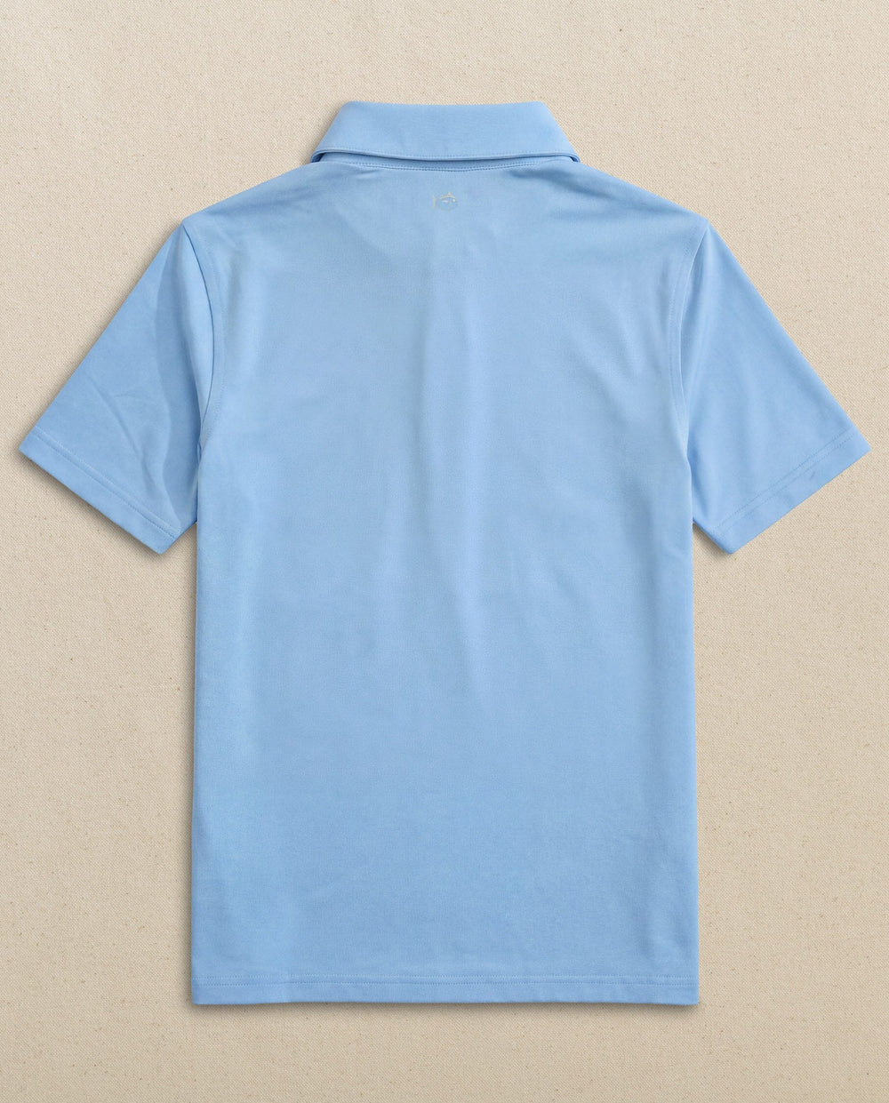 The back view of the Southern Tide Boys Driver Performance Skipjack Polo by Southern Tide - Sky Blue