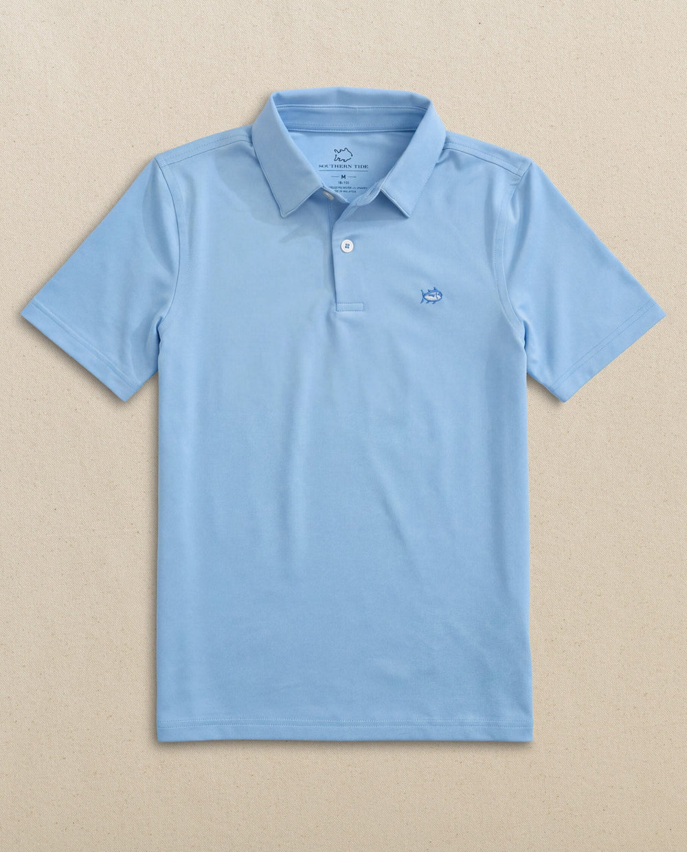 The front view of the Southern Tide Boys Driver Performance Skipjack Polo by Southern Tide - Sky Blue