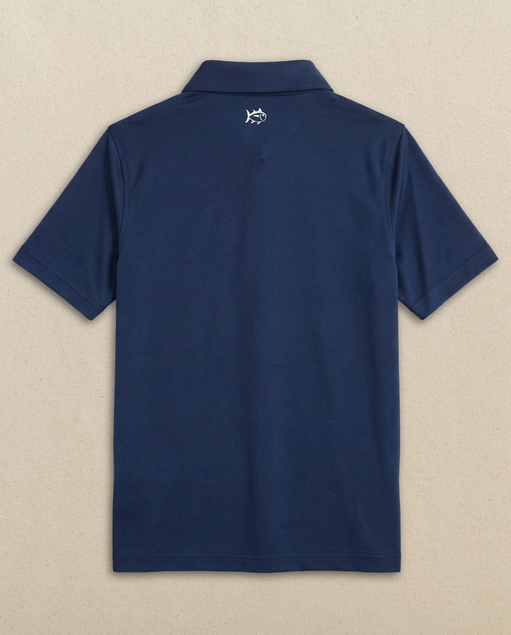 The back view of the Southern Tide Boys Driver Performance Skipjack Polo by Southern Tide - True Navy