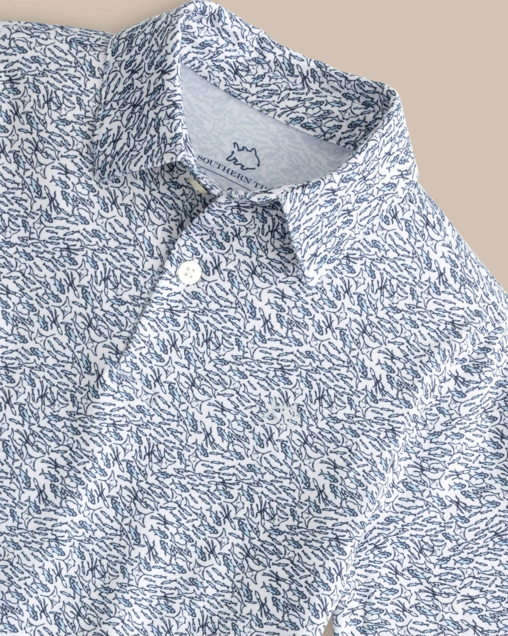 The detail view of the Southern Tide Boys Driver Schooling Fish Polo Shirt by Southern Tide - Classic White