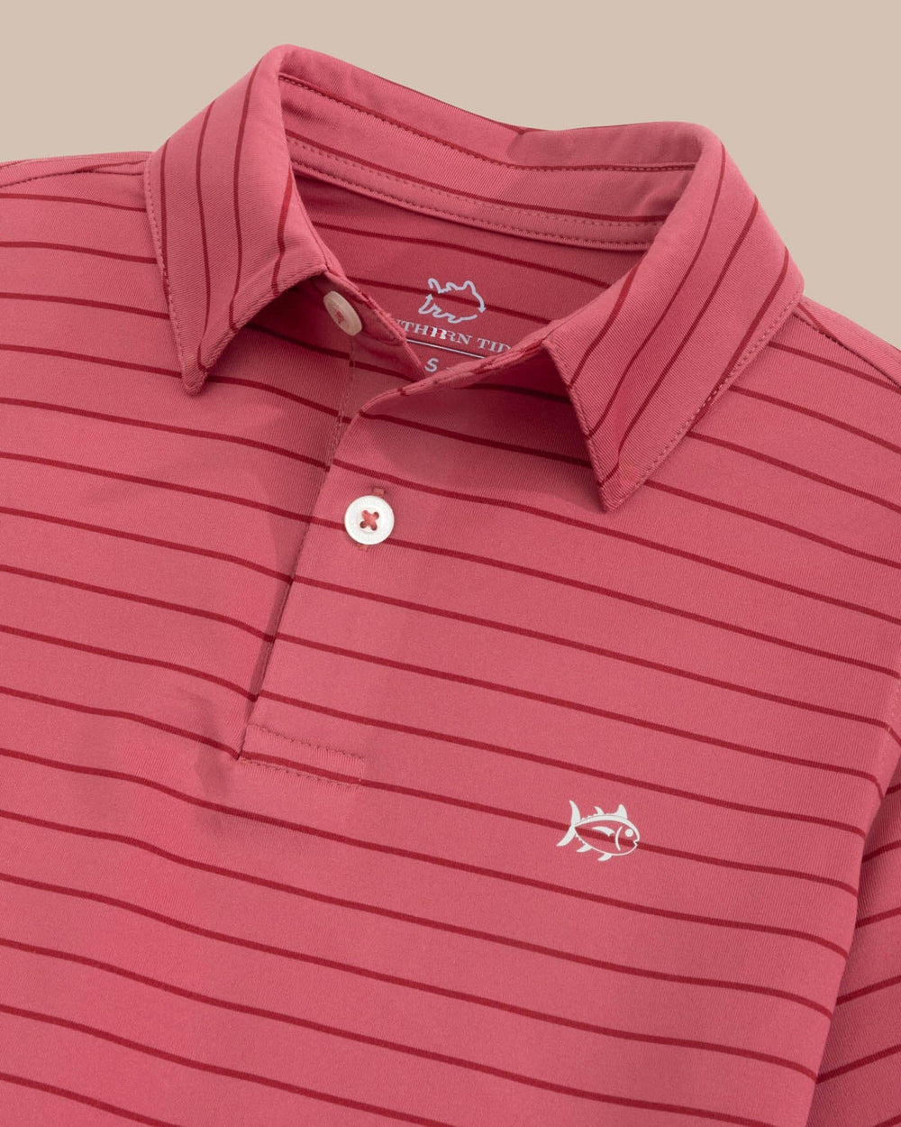 The detail view of the Southern Tide Boys Driver Seaglass Stripe Polo by Southern Tide - Mineral Red