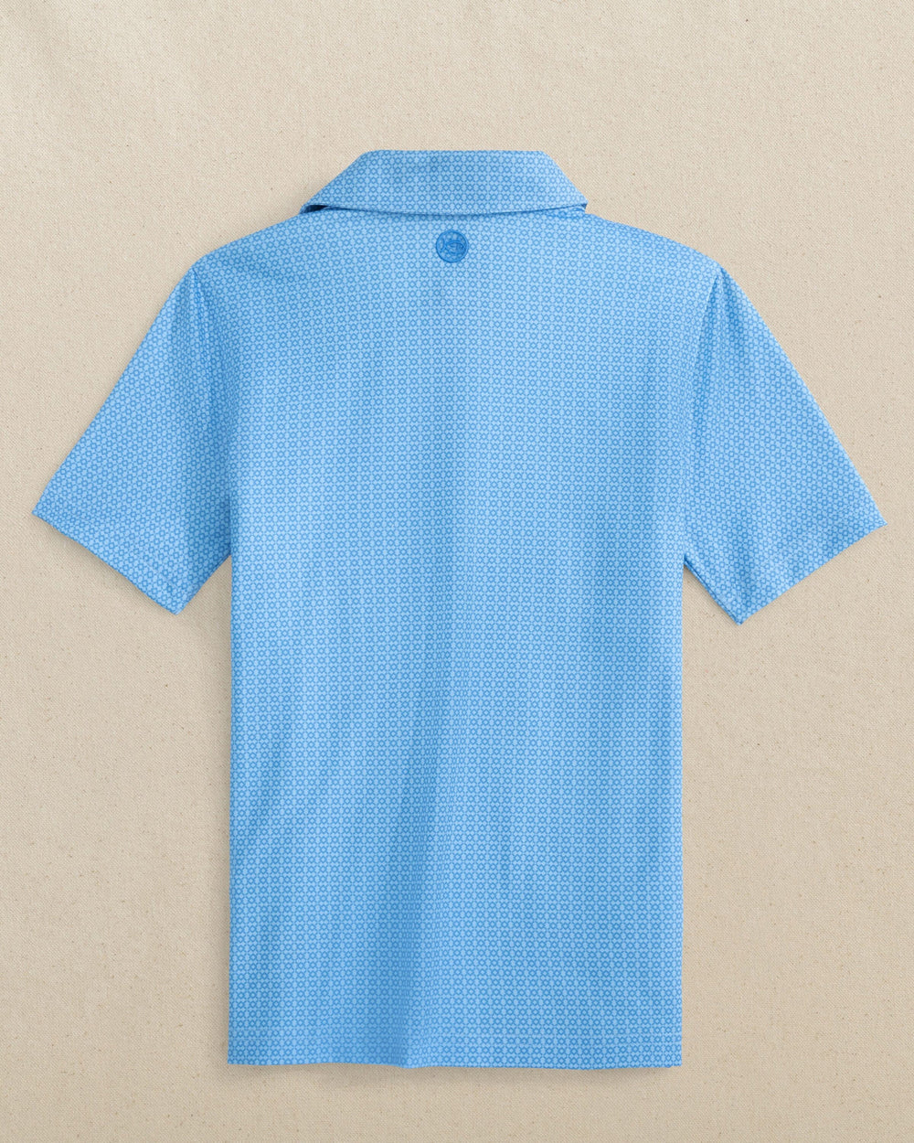 The back view of the Southern Tide Boys Driver Seaside Geo Printed Performance Polo by Southern Tide - Blue Stream