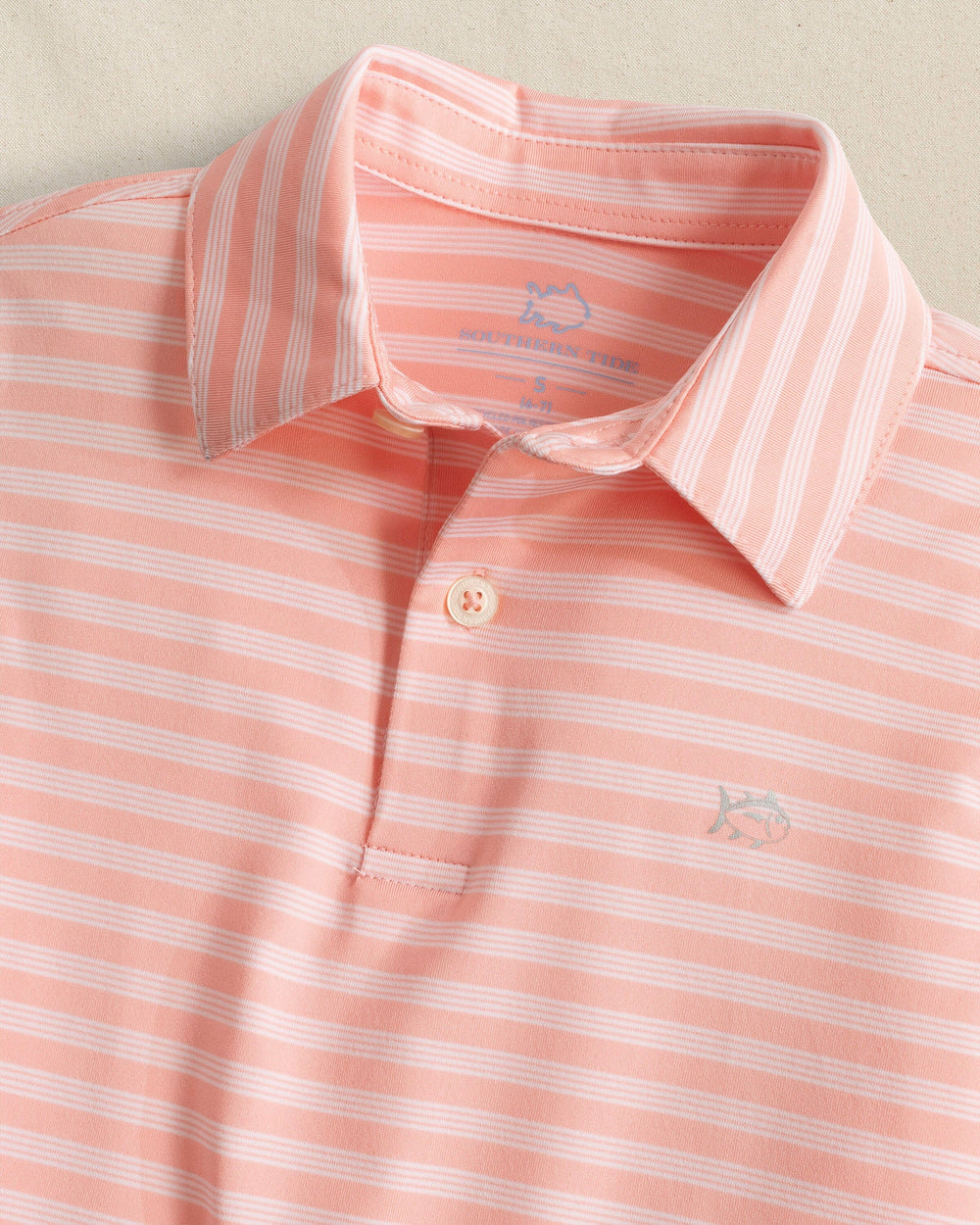 The detail view of the Southern Tide Boys Driver Sevilla Stripe Polo by Southern Tide - Petal Pink