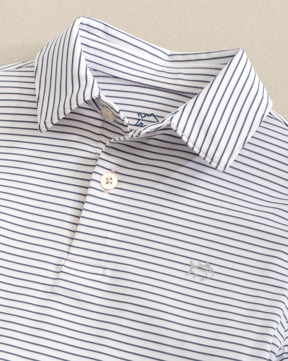 The detail view of the Southern Tide Boys Driver Sunbury Stripe Polo by Southern Tide - Classic White