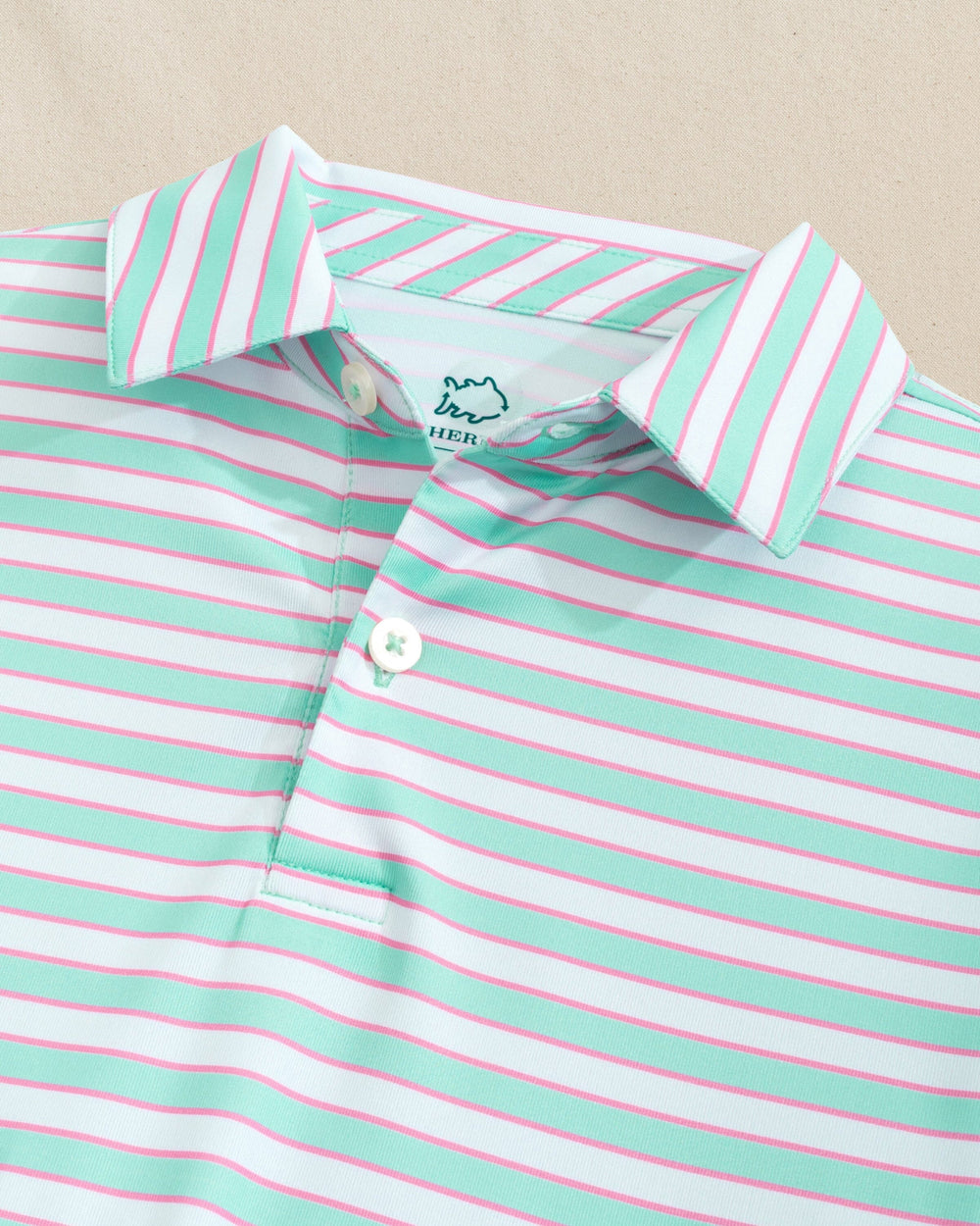 The detail view of the Southern Tide Boys Driver Waterway Stripe Printed Performance Polo by Southern Tide - Gulf Shores
