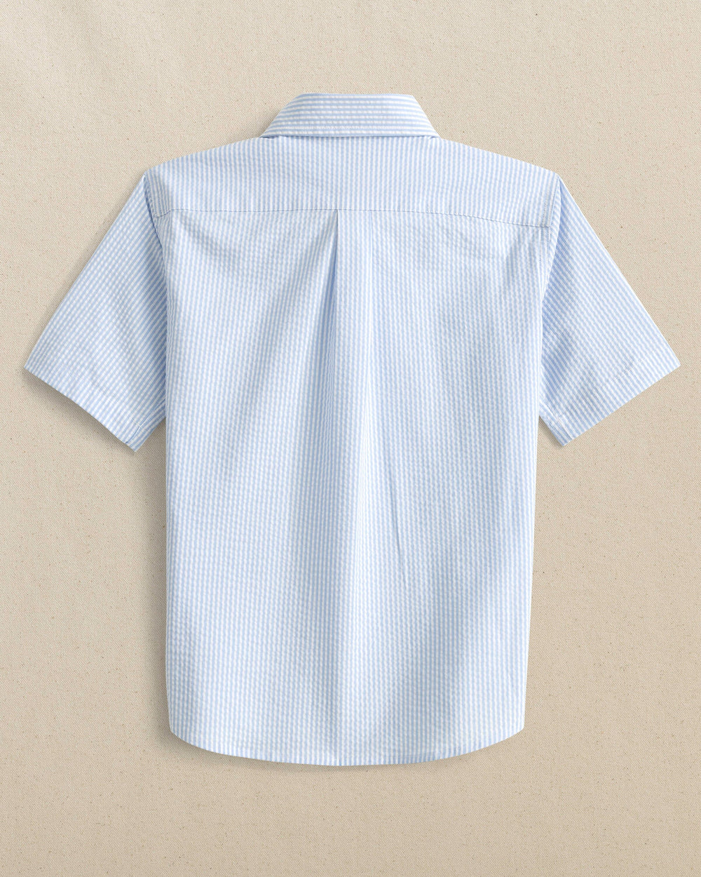 The back view of the Southern Tide Boys Folly Field Seersucker Short Sleeve Sport Shirt by Southern Tide - Ocean Channel