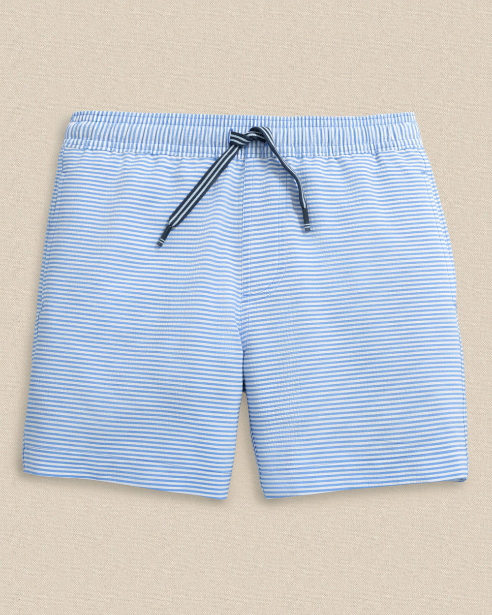 The front view of the Southern Tide Boys Gulf Haven Seersucker Stripe Maritime Swim Trunk by Southern Tide - Blue Stream
