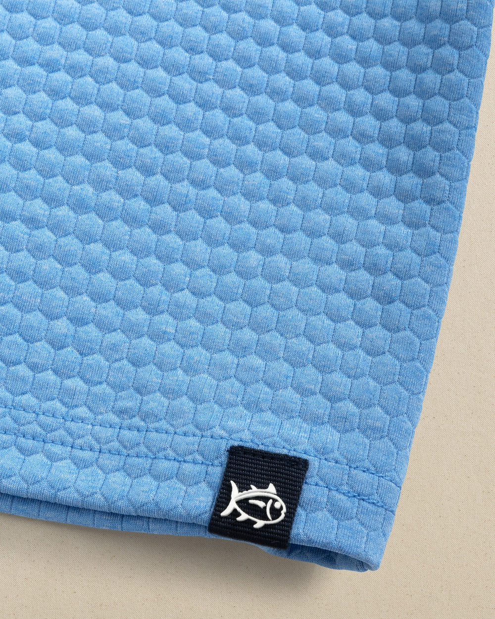 The detail view of the Southern Tide Boys Heather Scuttle Hoodie by Southern Tide - Heather Boat Blue