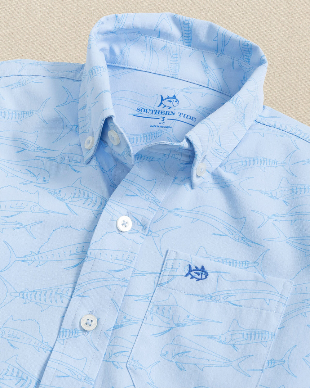 The detail view of the Southern Tide Boys Intercoastal Game Fish Short Sleeve Sport Shirt by Southern Tide - Cerulean