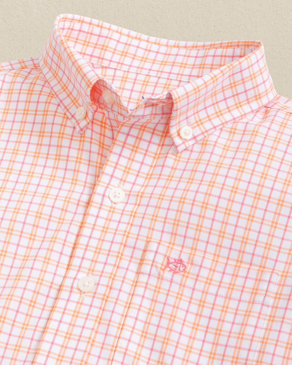 The detail view of the Southern Tide Boys Intercoastal Turnberry Plaid Long Sleeve Sport Shirt by Southern Tide - Peach Parfait