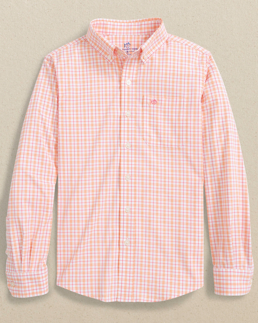 The front view of the Southern Tide Boys Intercoastal Turnberry Plaid Long Sleeve Sport Shirt by Southern Tide - Peach Parfait