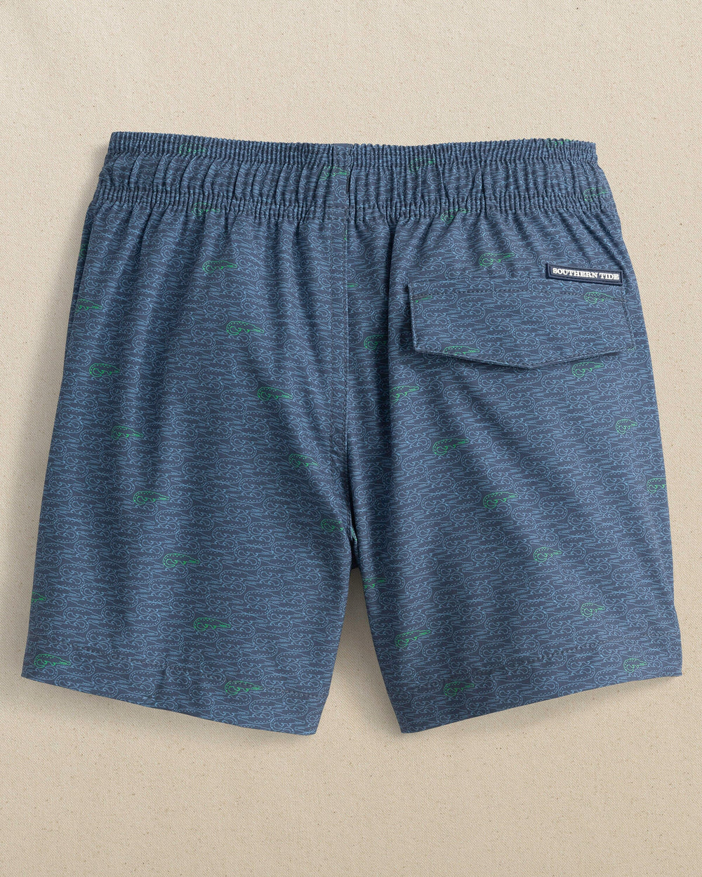 The back view of the Southern Tide Boys Make It Snappy Swim Trunk by Southern Tide - Light Indigo