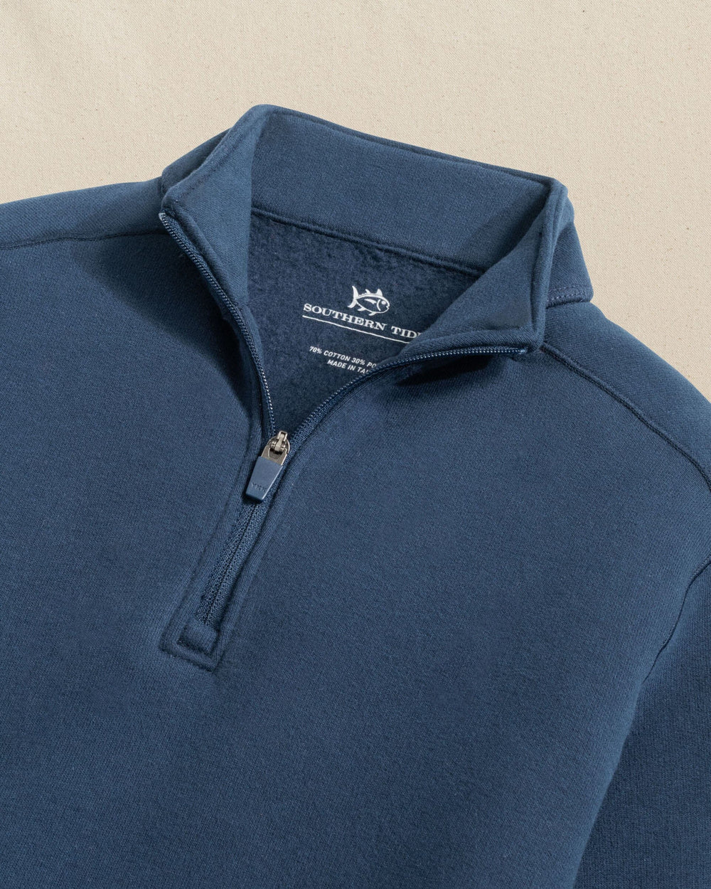 The detail view of the Southern Tide Boys Millview Fleece Quarter Zip by Southern Tide - Dress Blue
